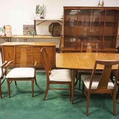 1170	9 PIECE MID CENTURY MODERN LIGHT WALNUT DINING ROOM SET, INCLUDING TABLE APPROXIMATELY 57 IN X 40 IN X 30 IN H WITH 3 - 12 IN...