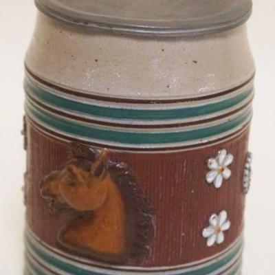 1037	GERMAN STIEN W/PEWTER LID & EMBOSSED HORSE HEAD, APPROXIMATELY 6 IN HIGH
