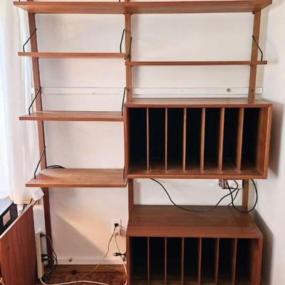1180	DANISH MID CENTURY MODERN ADJUSTABLE WALL UNIT WITH 6 SHELVES AND 2 CASED SHELVES, APPROXIMATELY 57 IN X 15 IN X 80 IN H
