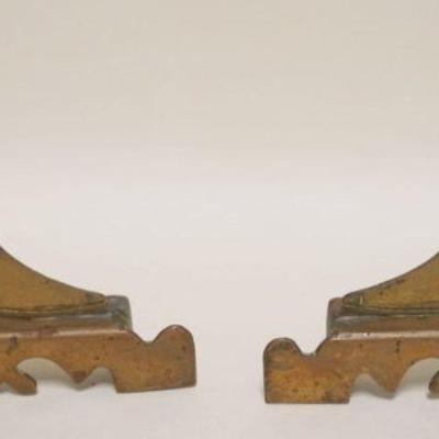 1068	PAIR OF BRASS ANTIQUE FOLK ART HIGH TOP BUTTON SHOES, EACH APPROXIMATELY 7 1/2 IN X 2 IN X 6 IN HIGH
