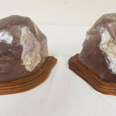 1280	PAIR OF LARGE AMETHYST QUARTZ CRYSTAL BOOKENDS ON WOOD BASES, ONE NEEDS TO BE REGLUED TO BASE, APPROXIMATELY 7 1/2 IN HIGH
