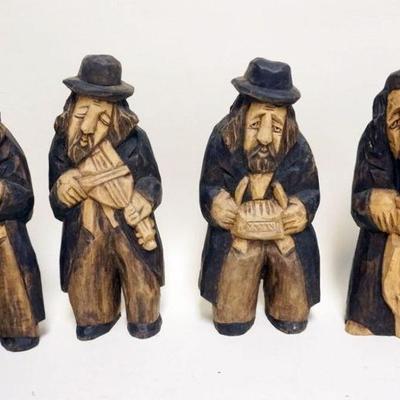 1140	GROUP OF 4 WOOD CARVED MUSICIANS, EACH APPROXIMATELY 10 1/2 IN HIGH
