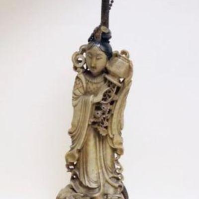 1086	CARVED SOAPSTONE FIGURE OF A WOMAN W/CLOCK, APPROXIMATELY 23 IN OVERALL
