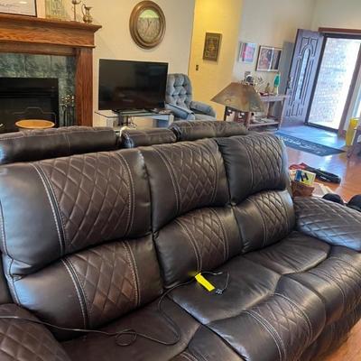All NEW , electric leather sofa and loveseat 