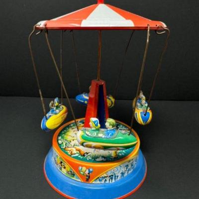 Hand-Crafted German Dachkarussell Tin Carousel - Vibrant Colors w/ Rotating Figures	