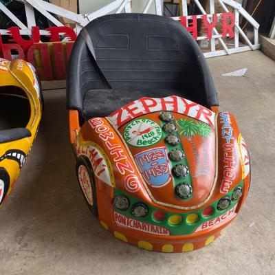 https://www.agesagoestatesales.com/product/pontchartrain-beach-fiber-glass-vintage-bummer-car-shells-orange/1027