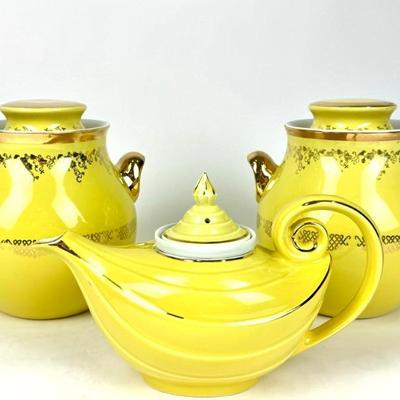 #73 • Two Hall Yellow & Gold Cookie Jars & Aladdin Teapot
WWW.LUX.BID