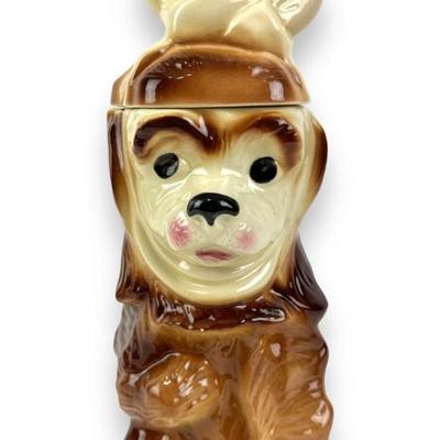 #277 • American Bisque USA Dog With Toothache Cookie Jar
WWW.LUX.BID