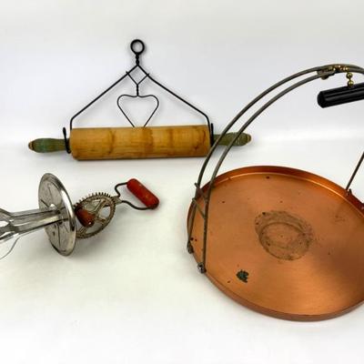 #50 • Vintage Kitchen Tools - Rolling Pin Rack & Hand Mixer & Shallow Copper Serving Tray
WWW.LUX.BID
