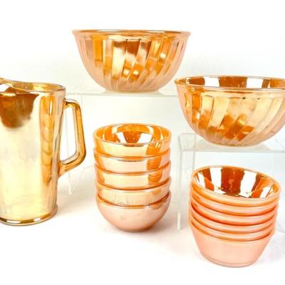 #178 • 1950's Fire King Peach Luster Swirl Pattern Bowls And Pitcher Set- 14 Pieces
WWW.LUX.BID
