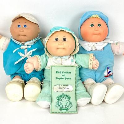 #105 • 1980's Vintage Cabbage Patch Dolls- Two Babies And One Preemie
WWW.LUX.BID