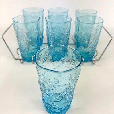 #181 • 7 Peacock Blue Crinkle Glass Juice Glasses in 6 Spot Carrier
WWW.LUX.BID