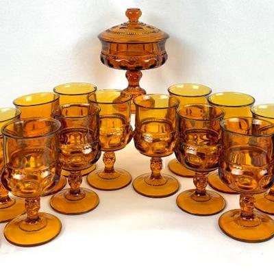 #194 • Indiana Glass King’s Crown Amber Glass Covered Dish and 14 Goblets
WWW.LUX.BID