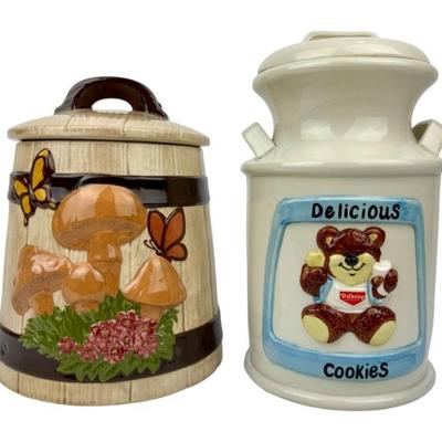 #318 • Two Cookie Jars - '80's "Delicious Cookies" Milk Jug and 70's Gare Barrel with Mushrooms &...