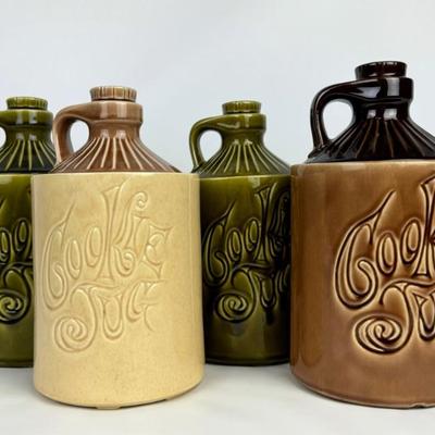 #164 • Four McCoy Moonshine Jug Cookie Jars
WWW.LUX.BID