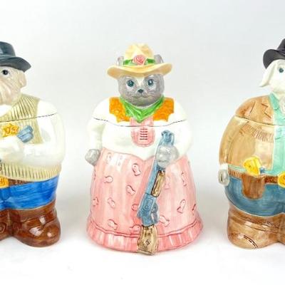 #92 • 3 Western Outlaw Cookie Jars By Hearth And Home Designs
WWW.LUX.BID
