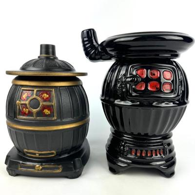 #124 • McCoy & American Bisque Pot Belly Stove Cookie Jars
WWW.LUX.BID