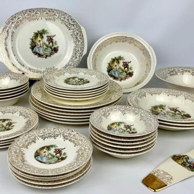 #215 • 22K Gold Triumph American Limoges China Set
WWW.LUX.BID