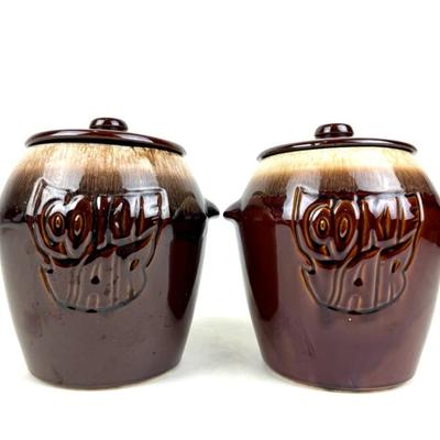 #142 • Two McCoy Brown Drip Glaze Cookie Jars
WWW.LUX.BID