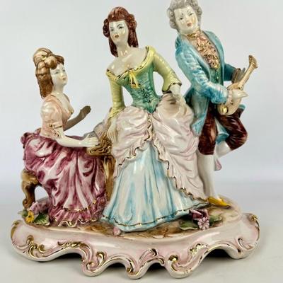 #239 • Italian Capodimonte Porcelain Tableau with Three Musicians & Piano
WWW.LUX.BID