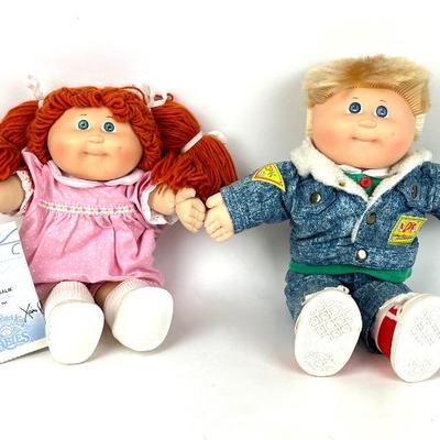 #99 • Vintage Set Of Cabbage Patch Dolls- Boy And Girl
WWW.LUX.BID