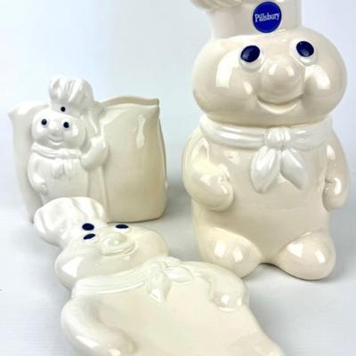 #128 • Pillsbury Poppin’ Fresh Doughboy Bank, Napkin Holder and Spoon Rest
WWW.LUX.BID