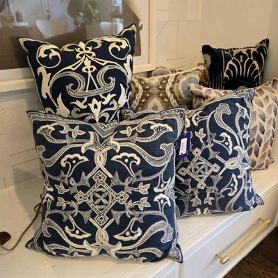 Dozens of BLISS and doen custom throw pillows