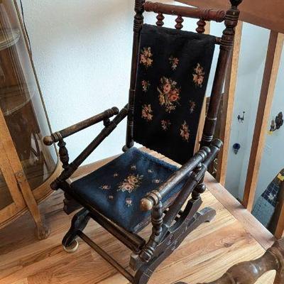 Antique Wooden Rocking Chair with Floral Upholstery