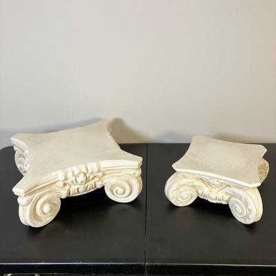 (2pc) Greek Roman Column Stands| Two Ionic Capital Riser Columns in plaster. Smaller one measures 9”L - 9”D - 5”H. - l. 13.5 x w. 13.5 x...