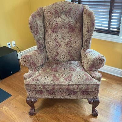 Ethan Allen Wing Chair | Paisley design upholstery in a light brown with red. Claw and ball feet. Date: 2/18/2010. Two matching throw...