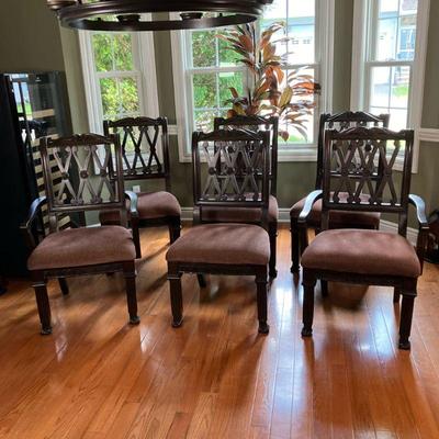 (6pc) Ashley Furniture DR Chairs | Two arm and four side chairs by Ashley Furniture in the Ledelle Series. Great look with carving...