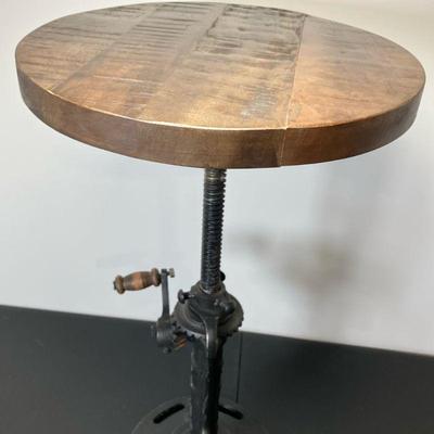 LR Home Industrial Stool | LR Home Adjustable Stool with cast iron base with walnut finished seat. Base has “AJ” and “1765” molded on it....