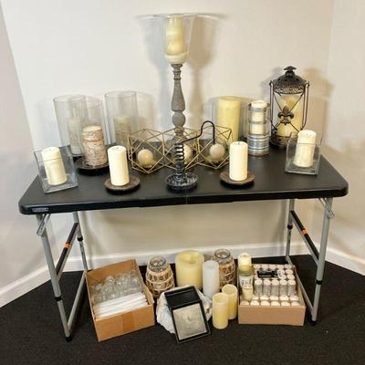 Candle Holders & Candles | Large lot of assorted candle holders, battery operated candles, taper candles, votive candles, tea lights...