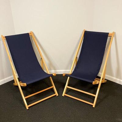 (2pc) Telescope Casual Cabana Beach Chairs | "Telescope Casual" pair of wood frame beach or deck chairs with navy blue...