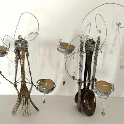 Pair of Artisan Steam Punk Style Crafted Candle Holders made from Flatware by Francesca Dellavalle. 

Each measuring about 11 inches tall...