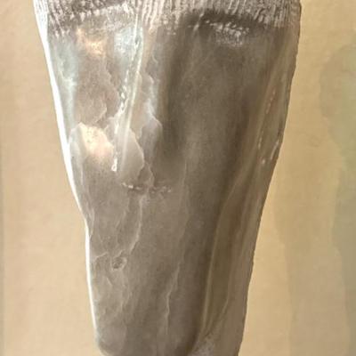Abstract Bust Carved Sculpture by Dwight Oglesby on Pedestal Stand 

The round base is adhered to the tall pillar. 

Quite a statement...