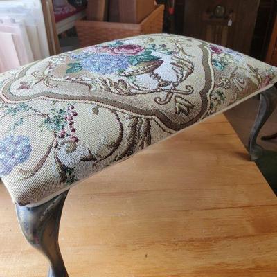 Needlepoint footstool with metal legs 