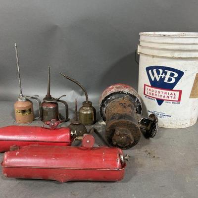 Lot 432 | Vintage Oil Cans, Stove Tanks, Motor & More
