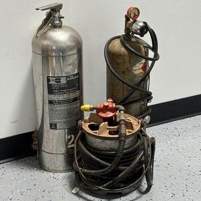 Lot 423 | Vintage Fire Extinguisher & Hose
