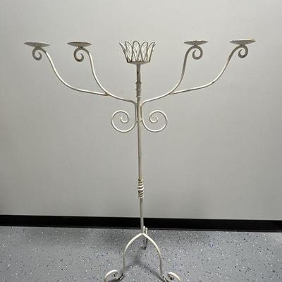 Lot 192 | Vintage Wrought Iron Candle Stand Four Feet
