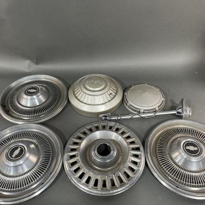 Lot 247 | Old Hubcaps and Auto Light
