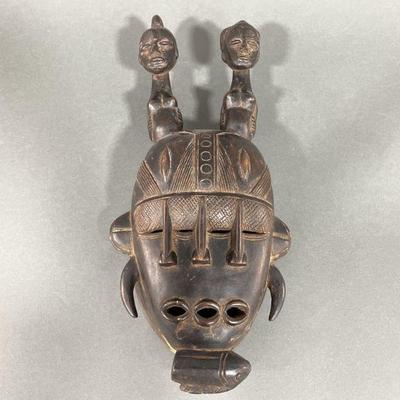 Lot 139 | Wooded Mask With Four Eyes & Three Mouths
