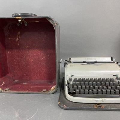 Lot 263 | Remington Rand Portable Typewriter & Case
