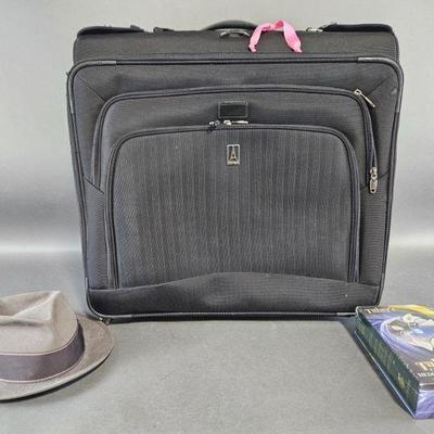 Lot 77 | Vtg TravelPro Rolling Suitcase
