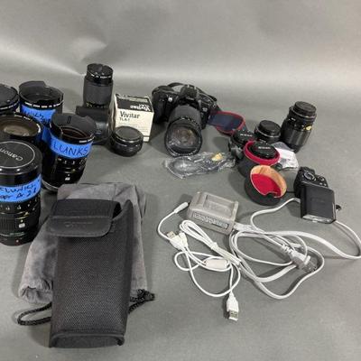 Lot 214 | Canon EOS 500 & Vivitar, Canon, Nikon & More
