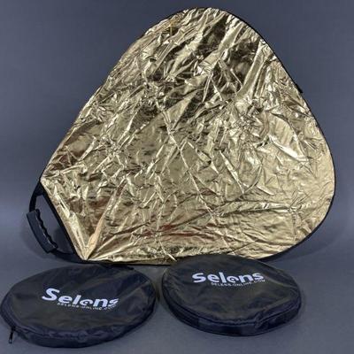 Lot 150 | Two Selens Five in One Reflectors with Handles
