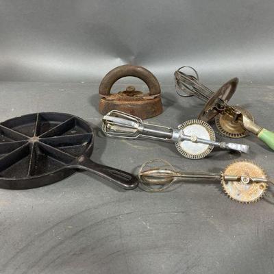 Lot 329 | Vintage Sad Iron, Cast Iron Pan & Egg Beaters
