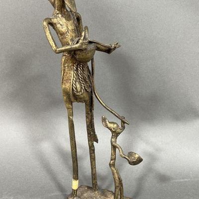 Lot 104 | Benin Brass Sculpture of Man and Child
