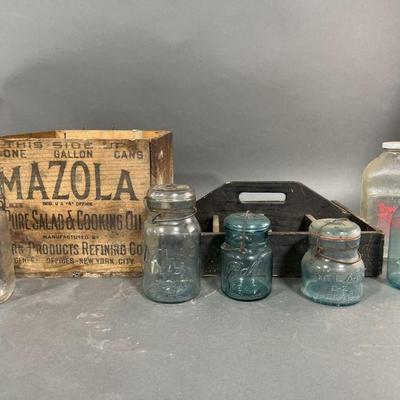 Lot 276 | Glass Canning Jars With Glass Lids & Crates

