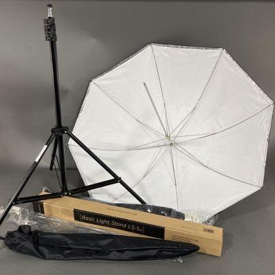 Lot 179 | Two Light Stands and Reflective Umbrellas
